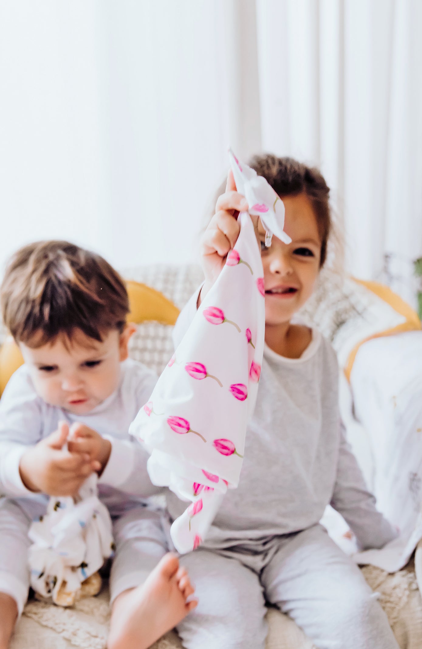 A soft, plush baby lovey security blanket featuring a beautifully detailed lotus flower print on a gentle fabric background. Designed with soothing colors and a calming floral pattern, it offers comfort and reassurance to infants and young children, making it an ideal soothing companion during naps and bedtime.