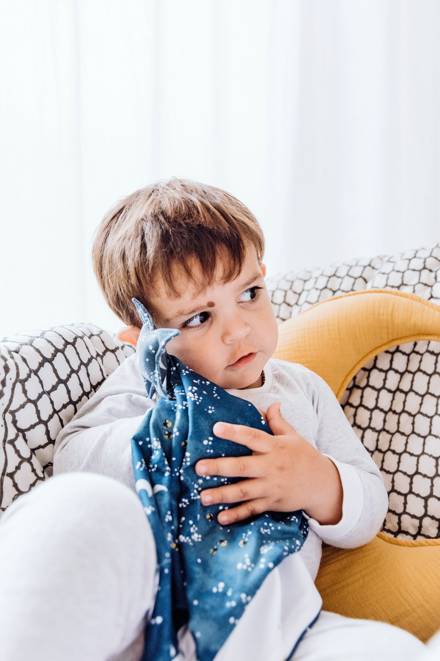 A calming baby lovey security blanket crafted with soft, high-quality fabric, featuring a detailed starry night print with twinkling stars and a crescent moon. Its soothing design helps create a peaceful bedtime environment, offering gentle reassurance and comfort for sleep routines.