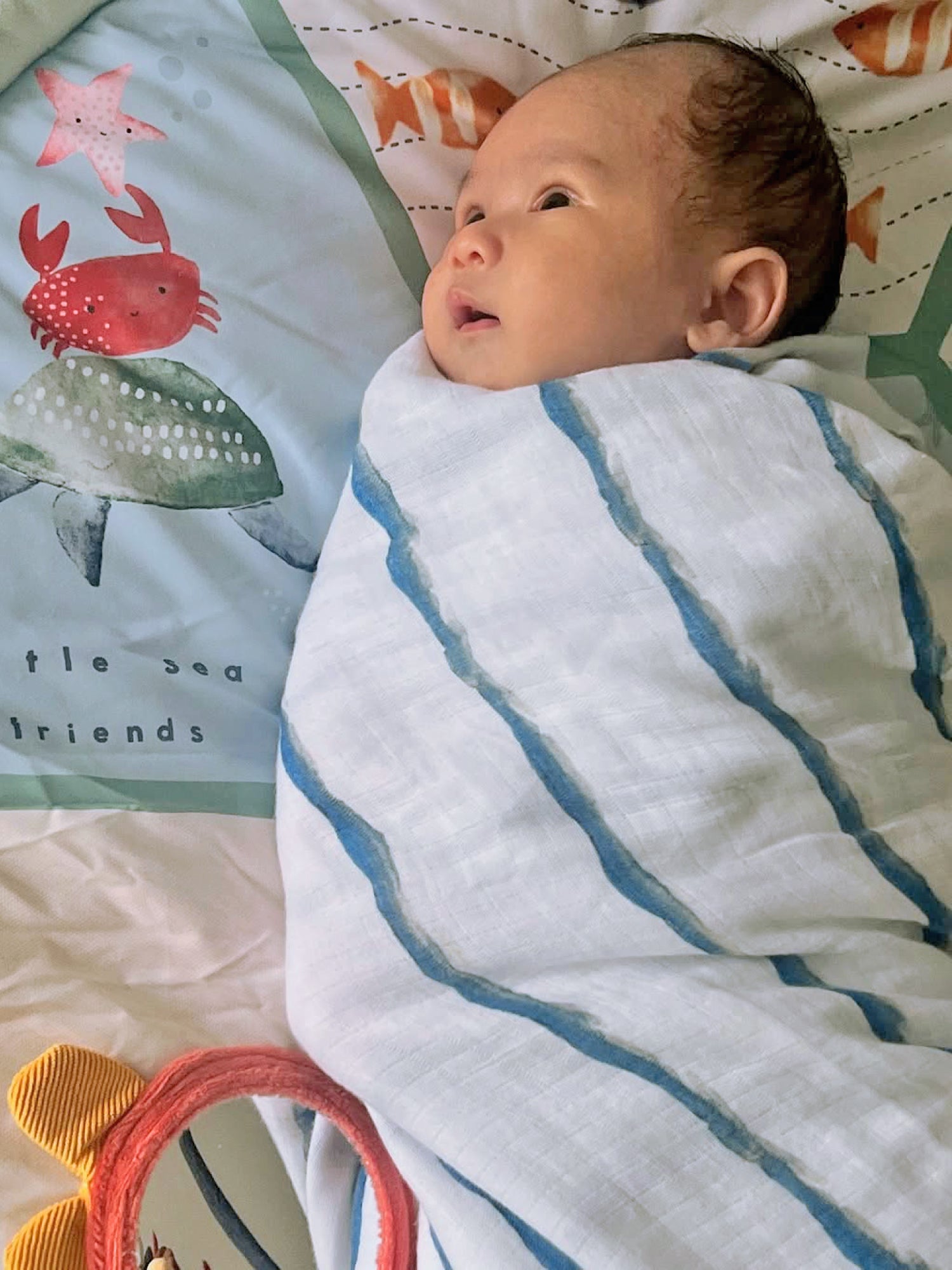 Organic Muslin Swaddle — Soft, breathable, and gentle for your baby's delicate skin, perfect for soothing and comforting.