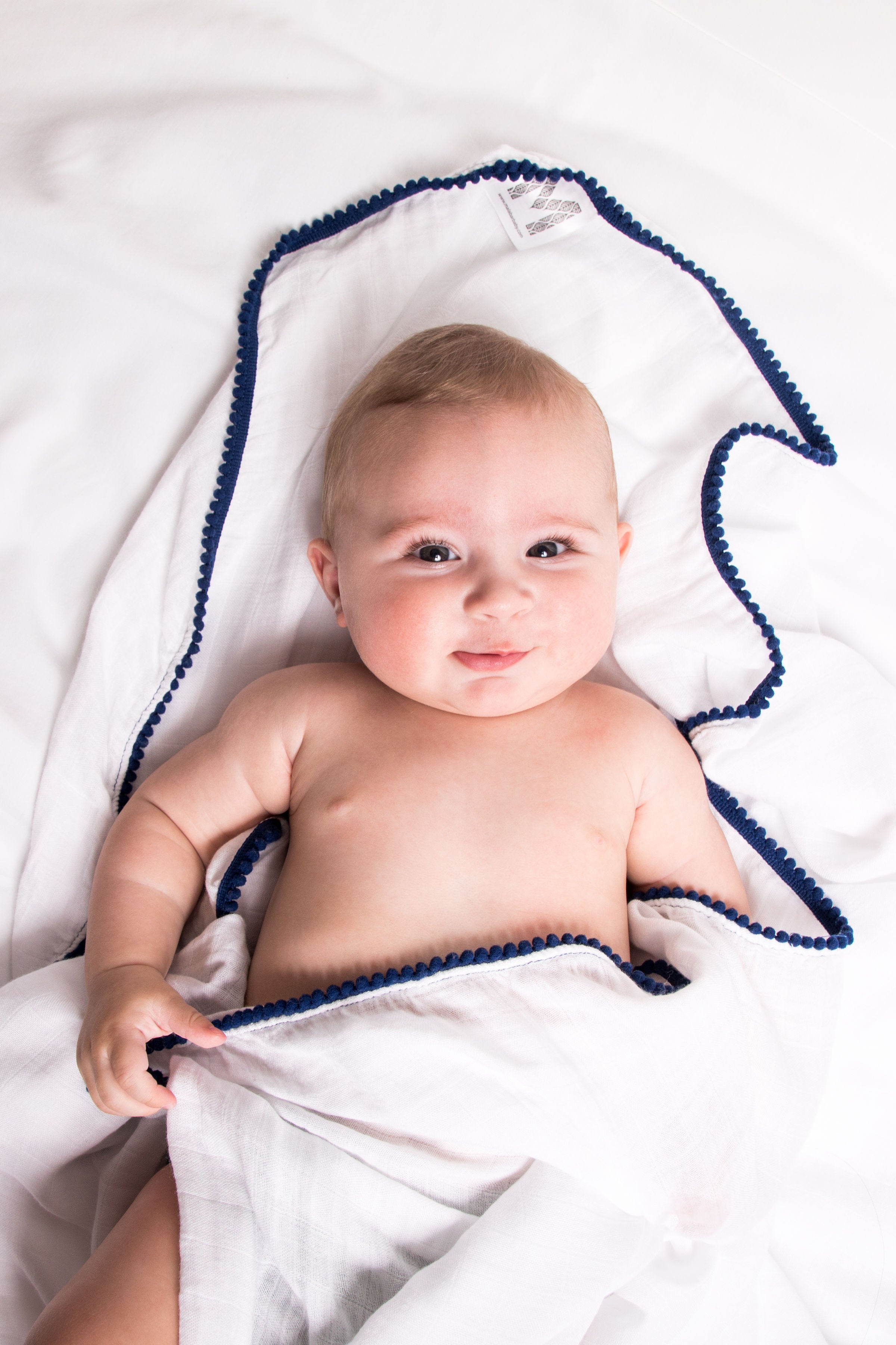 white bamboo swaddles, white cotton swaddles,  white baby swaddles, really soft baby swaddles, super soft baby swaddles, super soft gender neutral baby swaddles