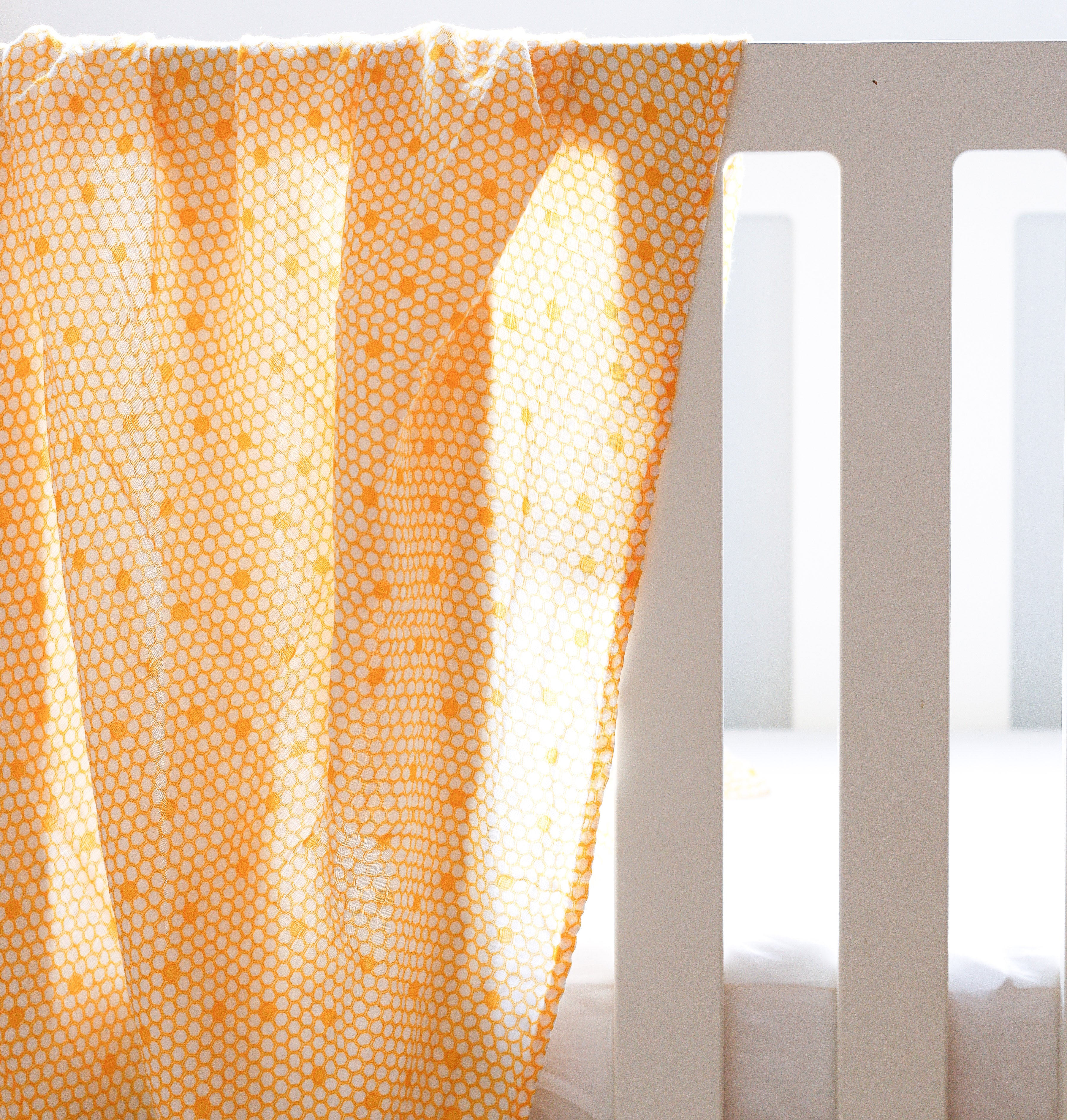 Malabar baby's 100% GOTS certified organic cotton super soft baby swaddle 2 pack. Swaddles get softer after every wash. The perfect newborn and baby shower gift. Swaddle #1 has a beautiful bee hive design and swaddle #2 has a beautiful bee design. These s