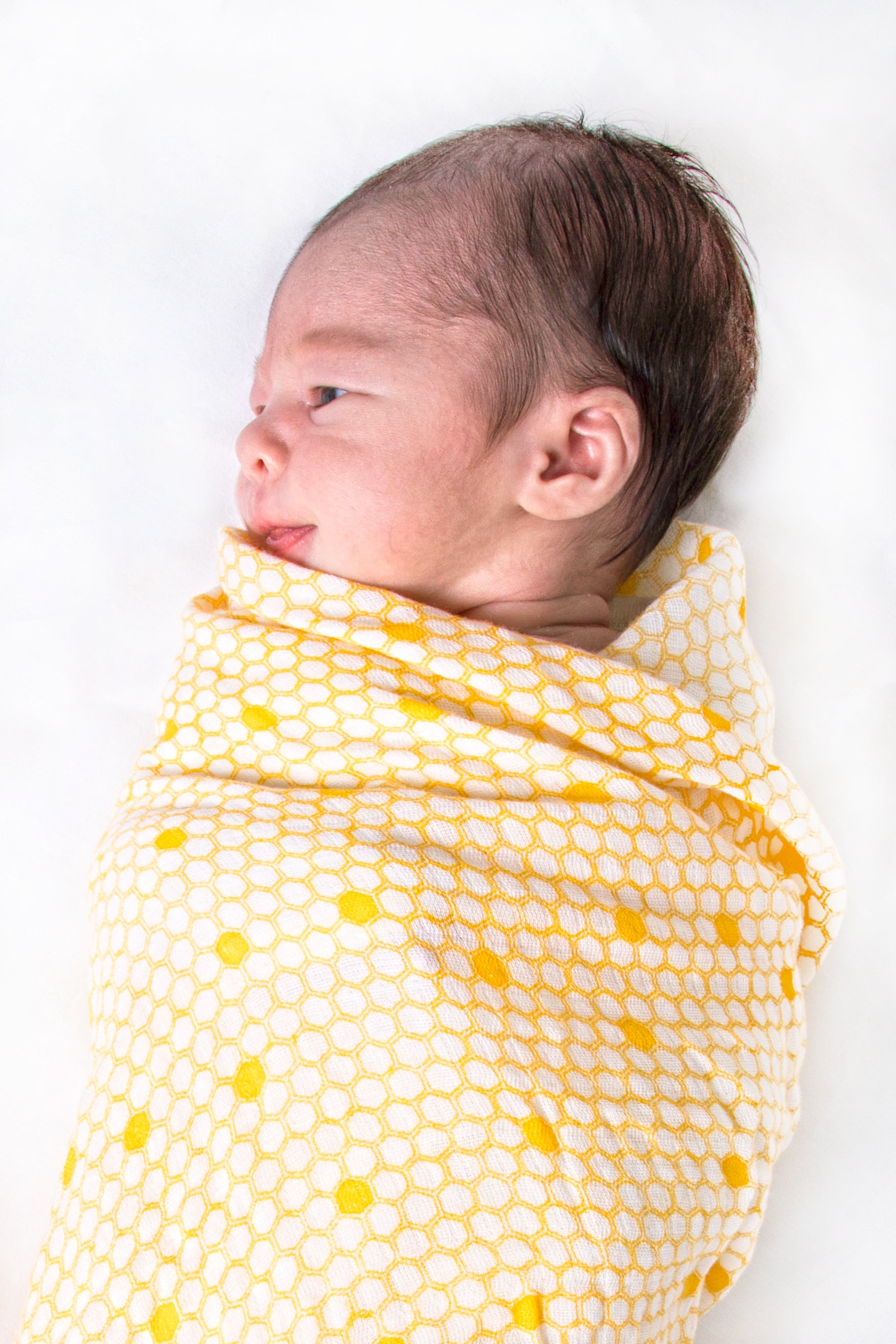 Malabar baby's 100% GOTS certified organic cotton super soft baby swaddle 2 pack. Swaddles get softer after every wash. The perfect newborn and baby shower gift.
