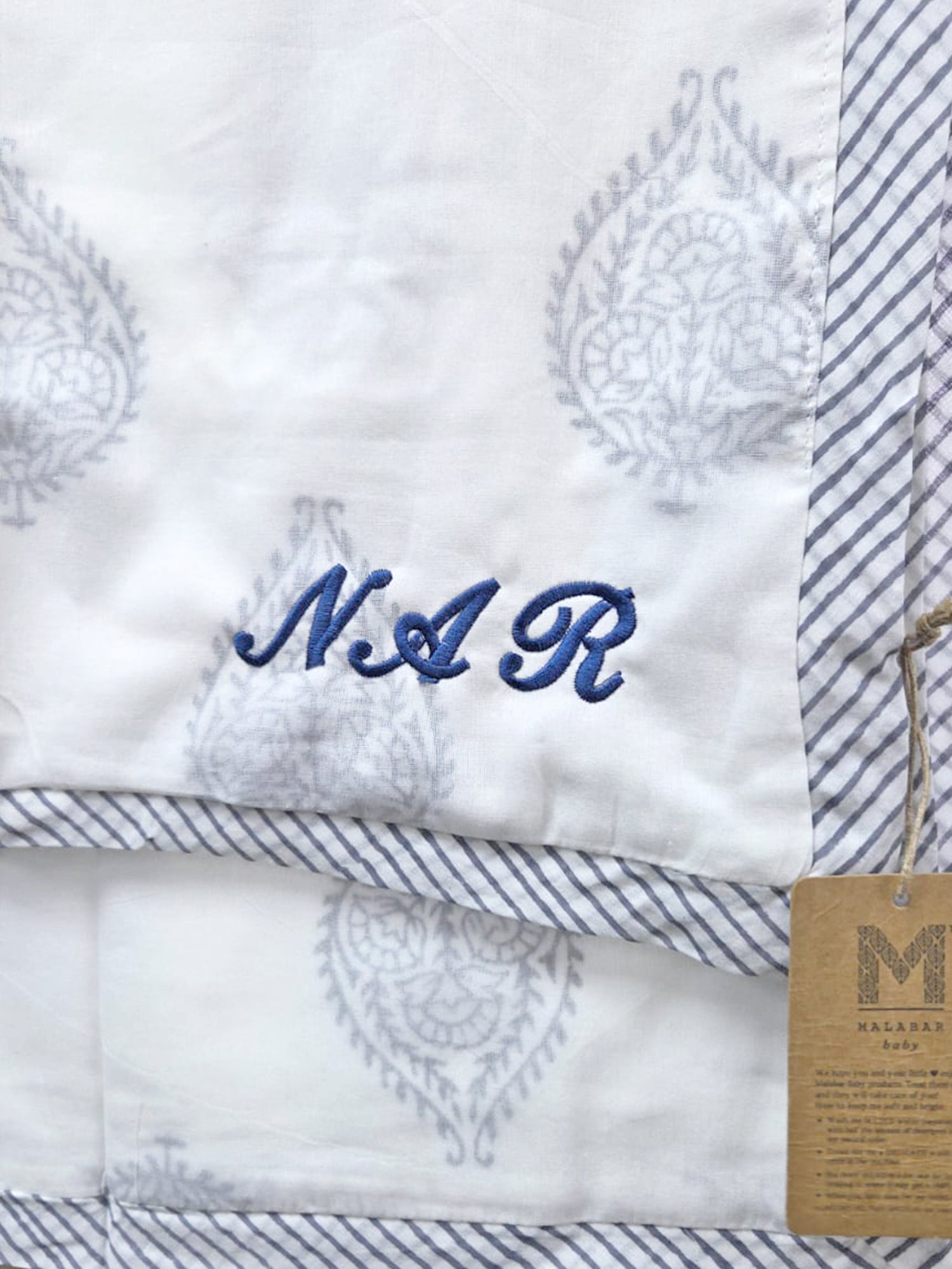Malabar Baby lightweight blanket with beautiful embroidery, ideal for celebrating a 100-day milestone, baby shower, birthday, or new baby arrival. Personalize it for free to make a memorable gift. Soft, plush fabric ensures comfort and warmth for your little one.