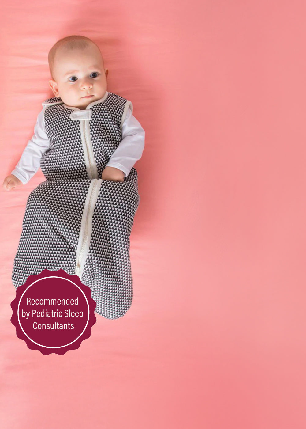 Safe sleep environment with a baby in a secure sleep sack