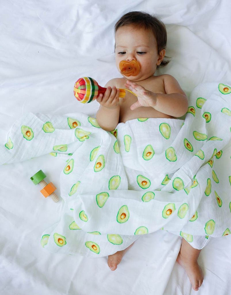 Malabar baby's 100% GOTS certified organic cotton super soft baby swaddle 2 pack. Swaddles get softer after every wash. The perfect newborn and baby shower gift. Swaddle 1 has a beautiful green avocado design and swaddle #2 has a beautiful green and white